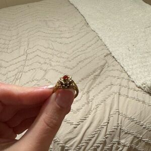 Gold Ring with Red Gemstones
